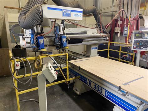 used komo cnc